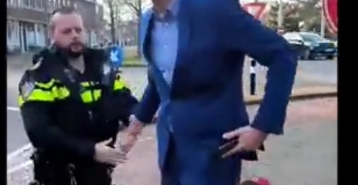 Self-Styled NUP “EU Ambassador” Dr Nico Arrested in The Hague Over Unauthorized ICC Protest